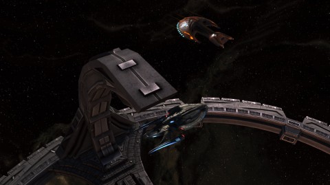 The USS Monterey and an illusory Ferengi ship at DS9
