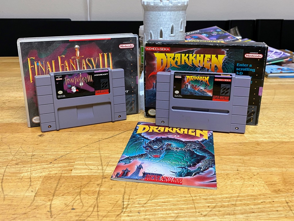 The original Final Fantasy 3 (6) cart, and the Drakkhen cart and manual