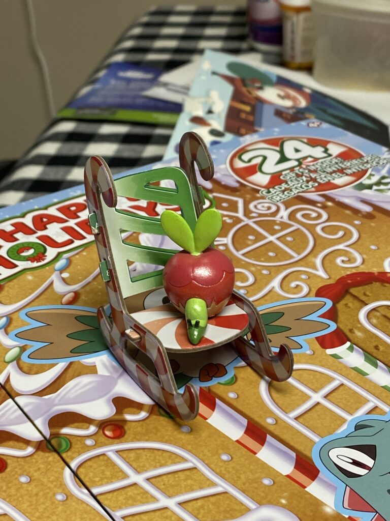I got a rocking chair for the second day of the Pokémon Advent calendar. Applin is rocking happily away.