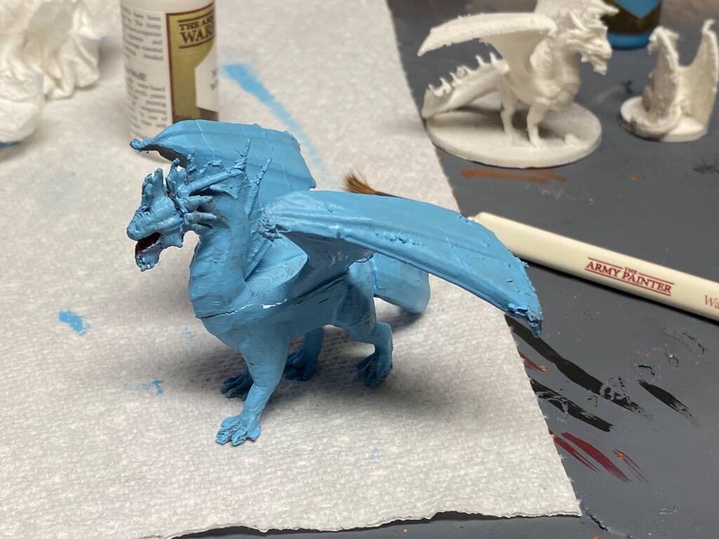 Wait, is this a blue dragon or a white dragon?