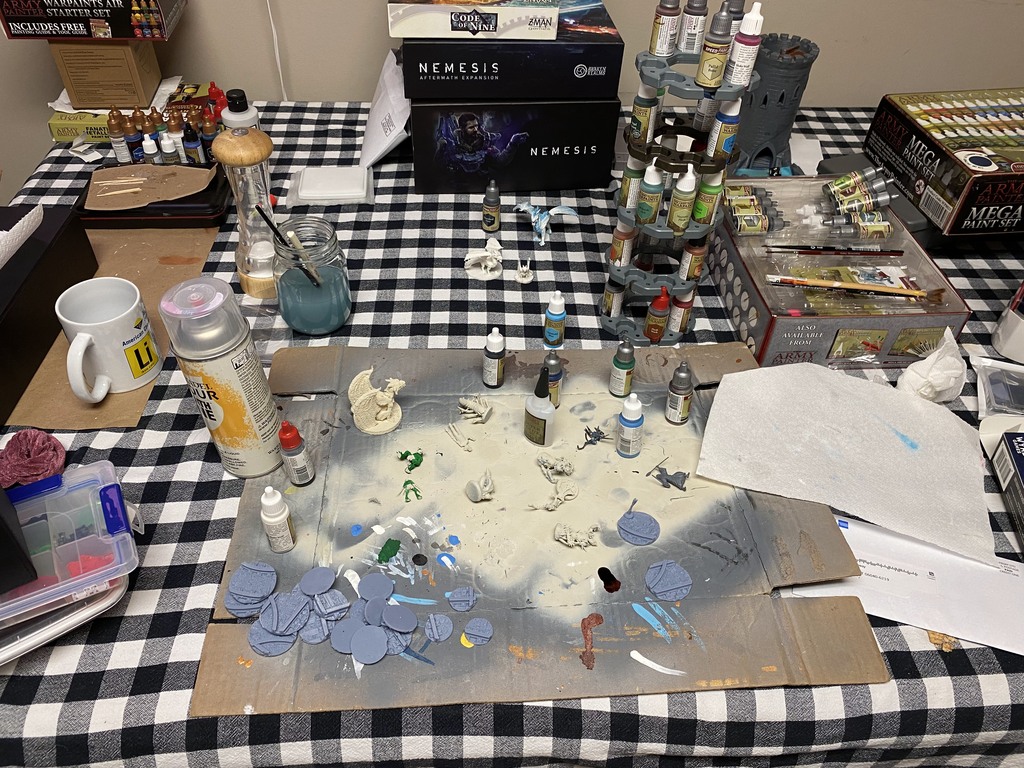 Assembling and painting models. The ones with some green are Metal Gamins